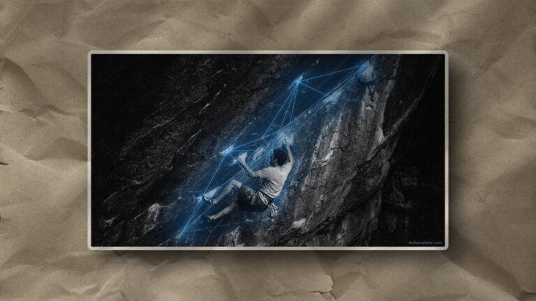 This image illustrates a climber’s path, as highlighted by digital lines mapping key contours along a steep, dark rock face.