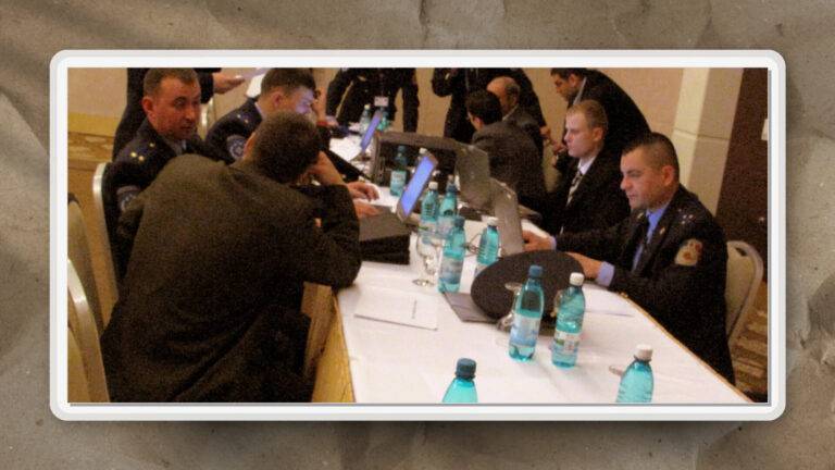 As seen here, participants in formal attire engage in collaborative discussion and analysis during a structured meeting setting.